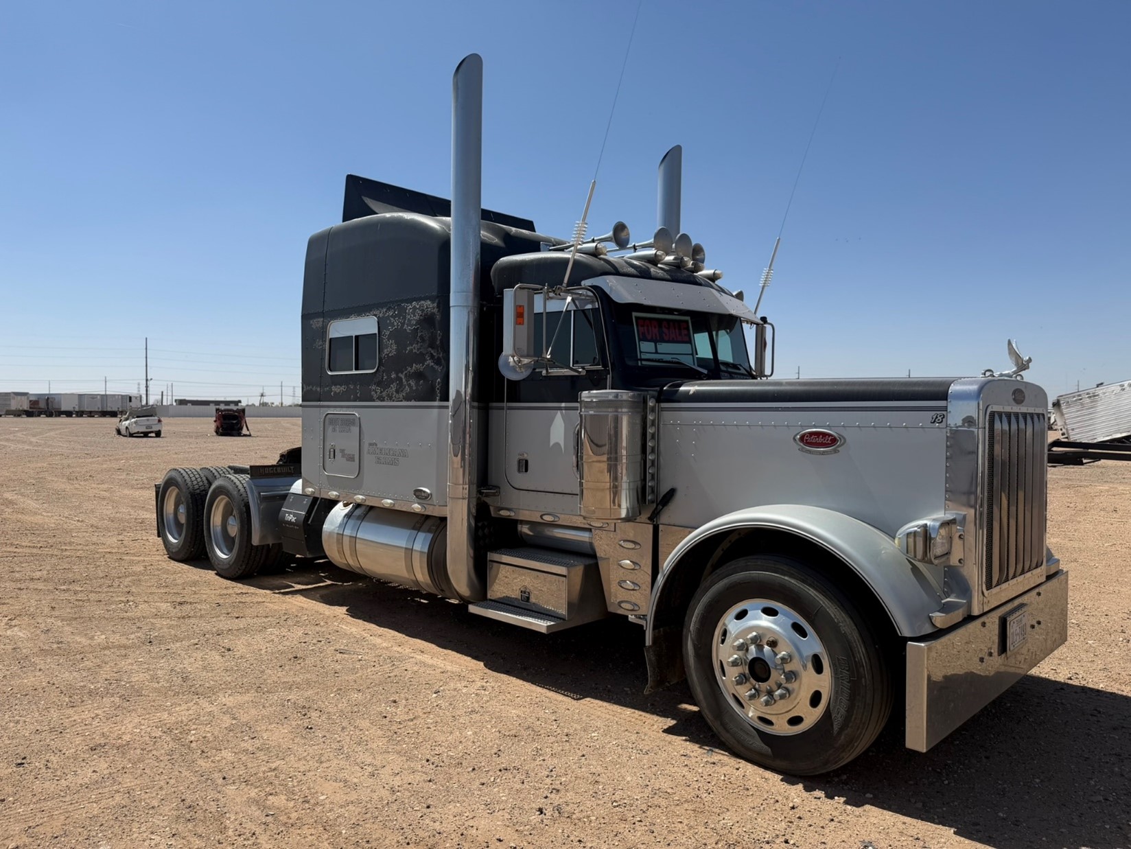 Image of a gray Peterbilt semi truck cab.